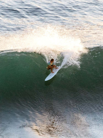 Surfer Surfing The Cosmic Twin Triple Stinger Joel Fitzgerarld Surfboard Top View 