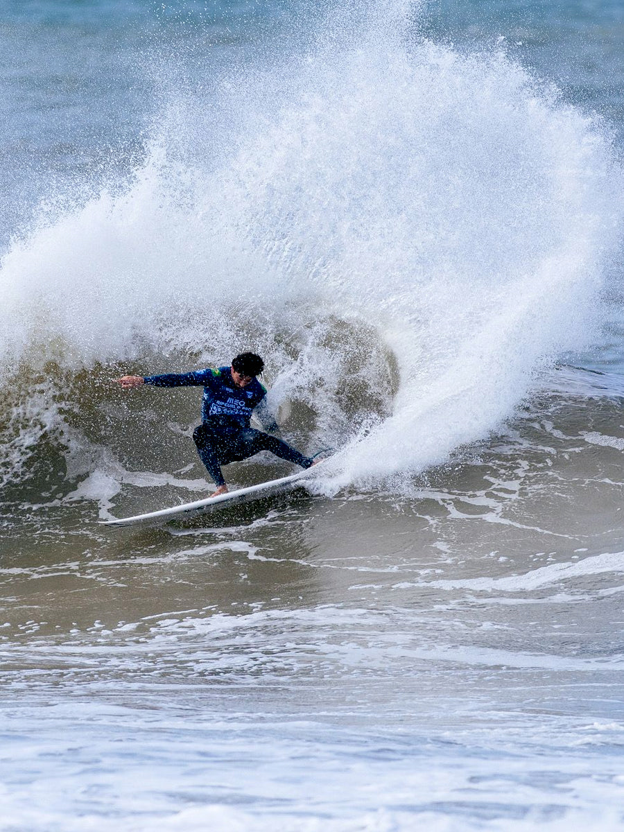 Yago Dora surfing on the Lost Formula 1 Round Pin surfboard, carving a wave