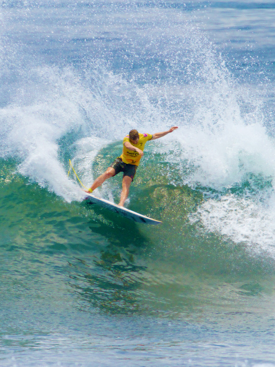 John John Florence surfing the Pyzel Power Tiger surfboard on a large wave