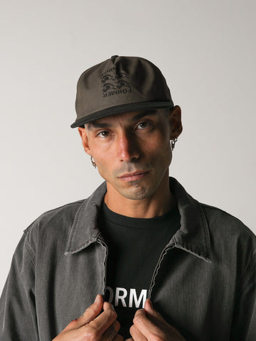 Former Model Wearing Replica Army Cap