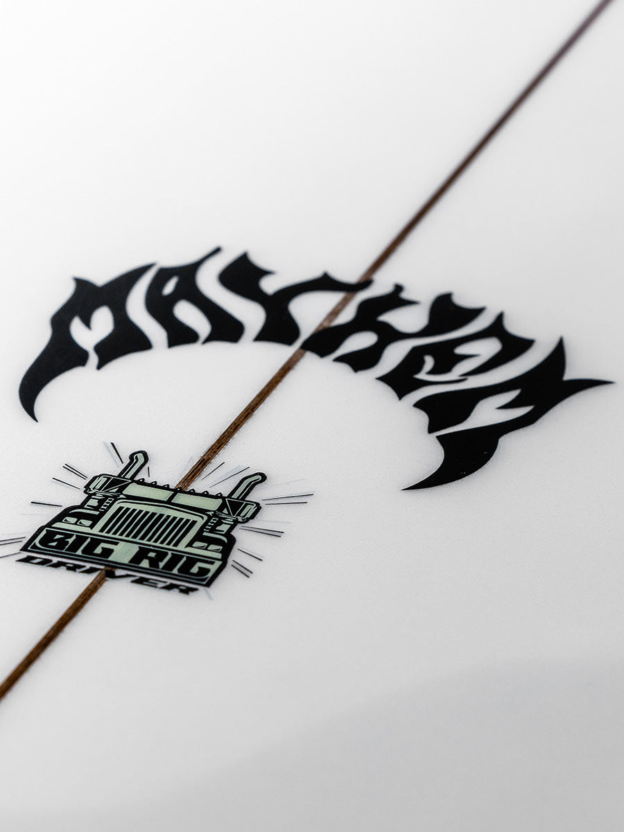 Close-up of the Lost Big Rig Driver surfboard logo decal on the deck
