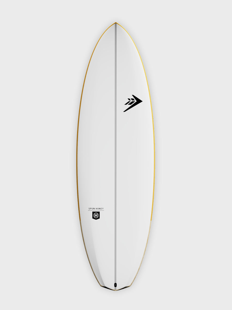 Firewire Spun Honey surfboard deck view with logo