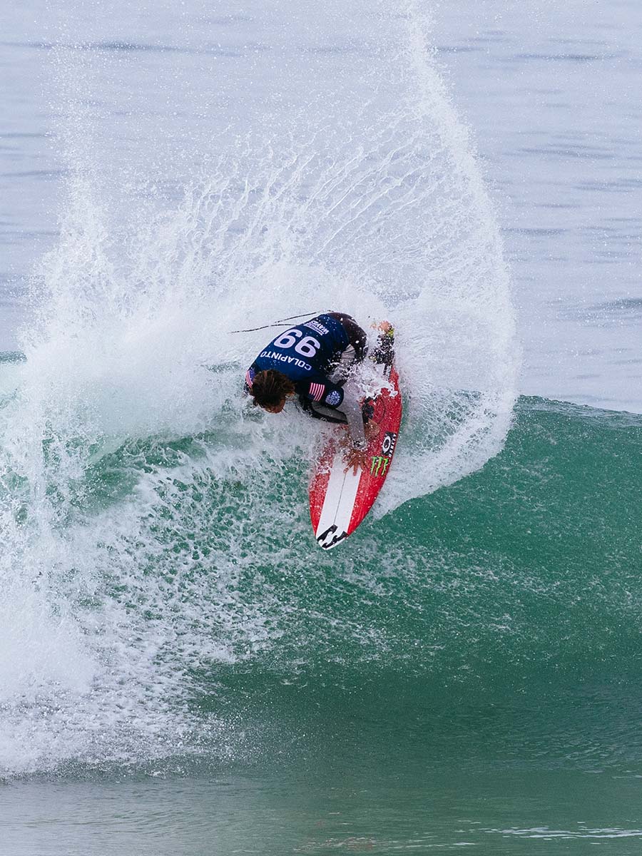 Pro surfer riding the Lost Driver 3.0 Round surfboard in competition